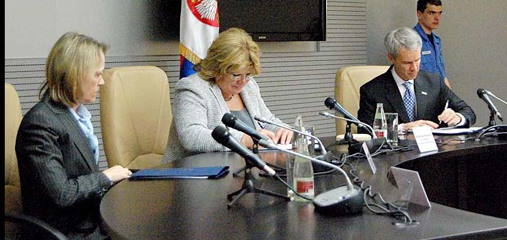 L to R: US Ambassador Warlick, HCC President Mesarovic, and Mission Director Harvey